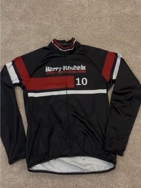 SUGOI Black Cycling Jacket with Red and White Racing Stripes